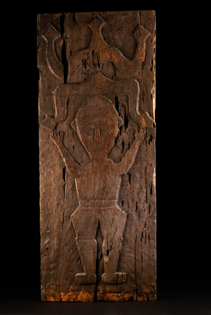 ancient Paiwan tribe panel carved with a standing man, part of a house partition or used as small doors or shutters – South Taiwan