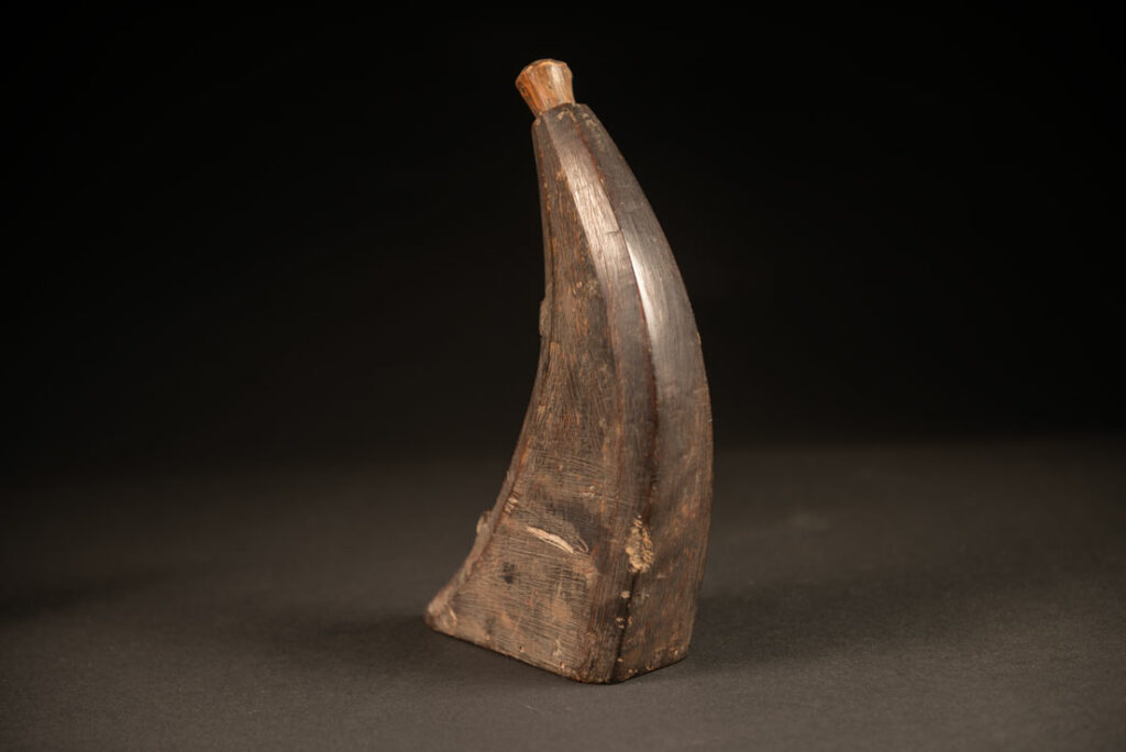 Attayal tribe wooden powder flask with a bamboo lid and no carving on it