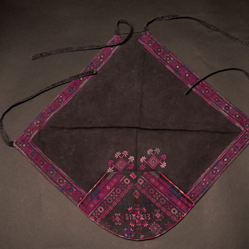 Female chest covering Puyuma tribe . The chest covering is crafted in a diamond shape and features intricate embroidery.