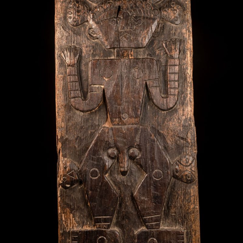 ancient Paiwan tribe panel carved with a standing man, part of a house partition or used as small doors or shutters – South Taiwan