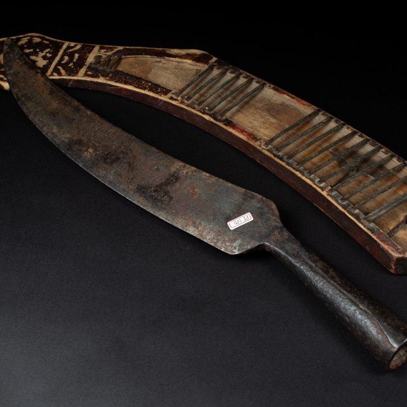 Sword of the Pingpu tribes (plains aborigines), featuring typical Pingpu style: floral painted design on the back of the scabbard; sword hilt forged in one piece with the blade, without separate assembly and attayal tribe influence on design.