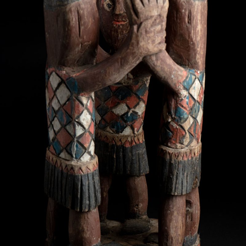 Painted wooden statue depicting figures performing a ritual dance – Paiwan tribe